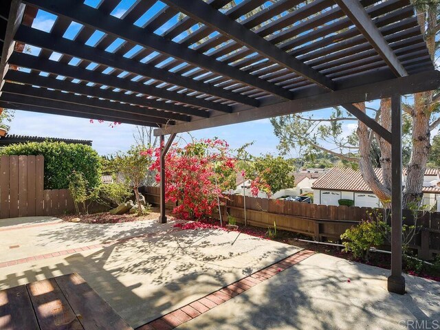 1714 Woodlark Ln, Fallbrook, CA 92028 - fenced backyard with a patio area and a pergola