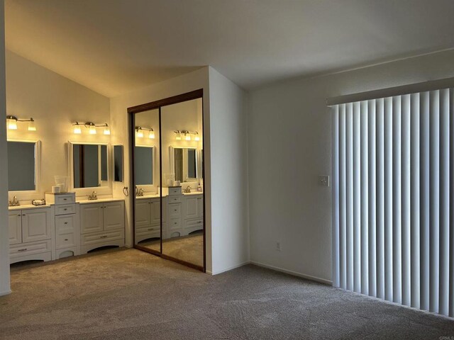 1714 Woodlark Ln, Fallbrook, CA 92028 - unfurnished bedroom with radiator heating unit, carpet flooring, ensuite bath, a sink, and lofted ceiling