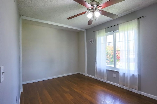 7320 Ramona Ave, Rancho Cucamonga, CA 91730 - unfurnished room with dark wood finished floors, ceiling fan, plenty of natural light, and a textured ceiling