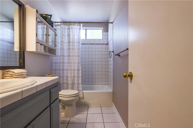 7320 Ramona Ave, Rancho Cucamonga, CA 91730 - full bath with tile patterned floors, toilet, vanity, baseboards, and shower / bath combo with shower curtain