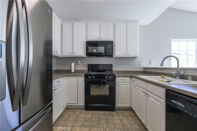 7320 Ramona Ave, Rancho Cucamonga, CA 91730 - kitchen with black appliances, a sink, white cabinets, stone finish flooring, and dark countertops