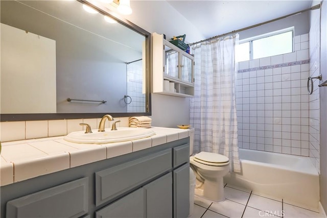 7320 Ramona Ave, Rancho Cucamonga, CA 91730 - bathroom featuring tile patterned floors, vanity, toilet, and shower / bathtub combination with curtain
