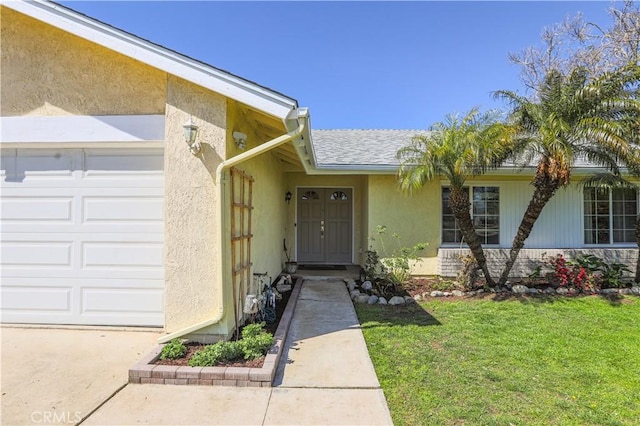7320 Ramona Ave, Rancho Cucamonga, CA 91730 - entrance to property with an attached garage, a lawn, and stucco siding