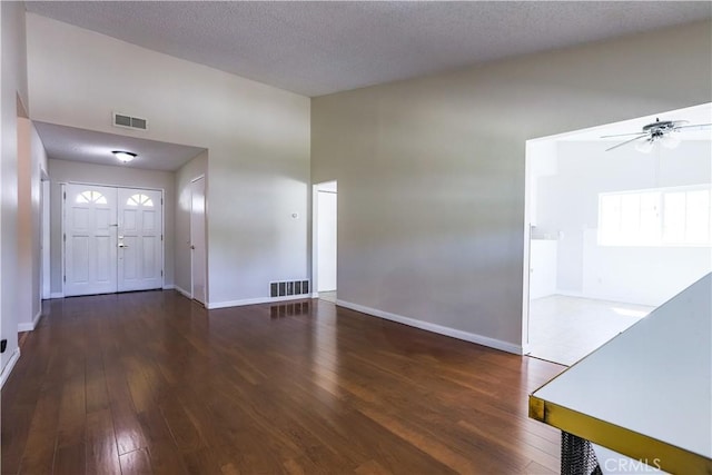 7320 Ramona Ave, Rancho Cucamonga, CA 91730 - entrance foyer featuring wood-type flooring, a ceiling fan, baseboards, and a textured ceiling