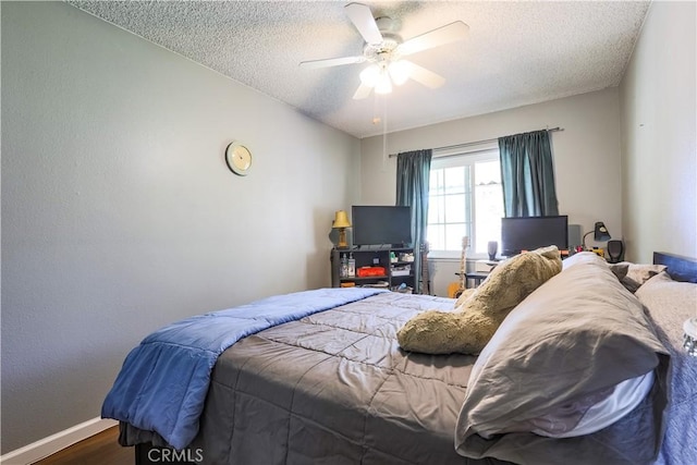 7320 Ramona Ave, Rancho Cucamonga, CA 91730 - bedroom featuring a textured ceiling, wood finished floors, a ceiling fan, and baseboards