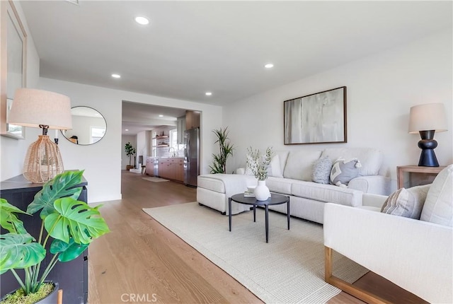 5039 W 135th St, Hawthorne, CA 90250 - living room featuring wood finished floors and recessed lighting