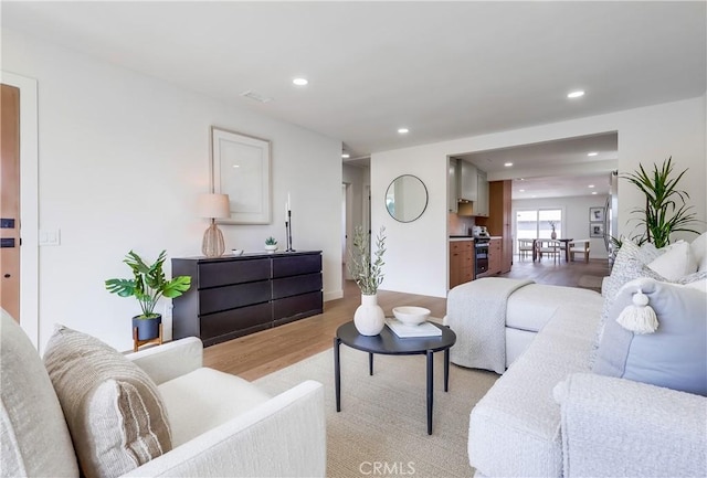 5039 W 135th St, Hawthorne, CA 90250 - living room featuring light wood finished floors and recessed lighting