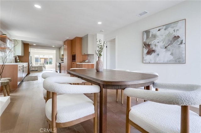 5039 W 135th St, Hawthorne, CA 90250 - dining area with recessed lighting and light wood finished floors