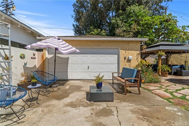 garage featuring fence
