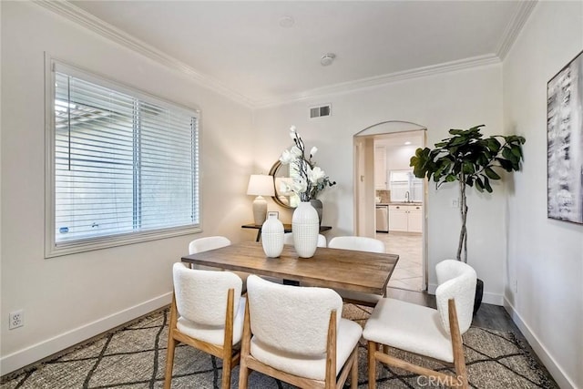 3184 Toopal Dr, Oceanside, CA 92058 - dining area featuring crown molding and arched walkways