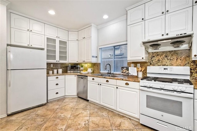 3184 Toopal Dr, Oceanside, CA 92058 - kitchen with white appliances, under cabinet range hood, decorative backsplash, white cabinets, and recessed lighting