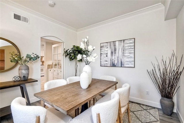 3184 Toopal Dr, Oceanside, CA 92058 - dining space with crown molding and light wood-style floors