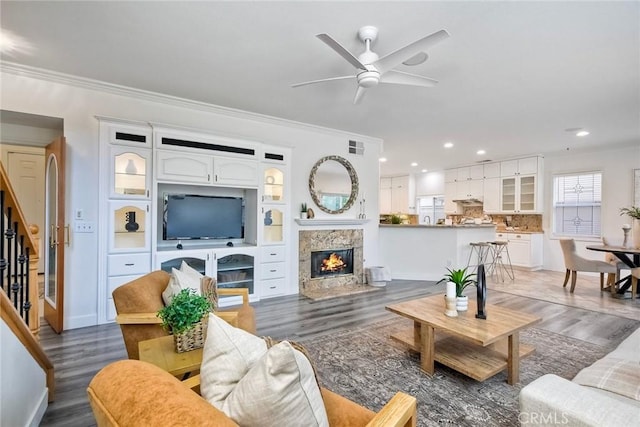 3184 Toopal Dr, Oceanside, CA 92058 - living room featuring a ceiling fan, wood finished floors, crown molding, stairway, and recessed lighting