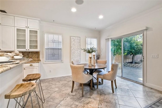 3184 Toopal Dr, Oceanside, CA 92058 - dining space with crown molding, light tile patterned floors, and recessed lighting