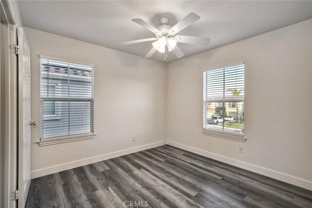 3184 Toopal Dr, Oceanside, CA 92058 - empty room with dark wood finished floors and ceiling fan