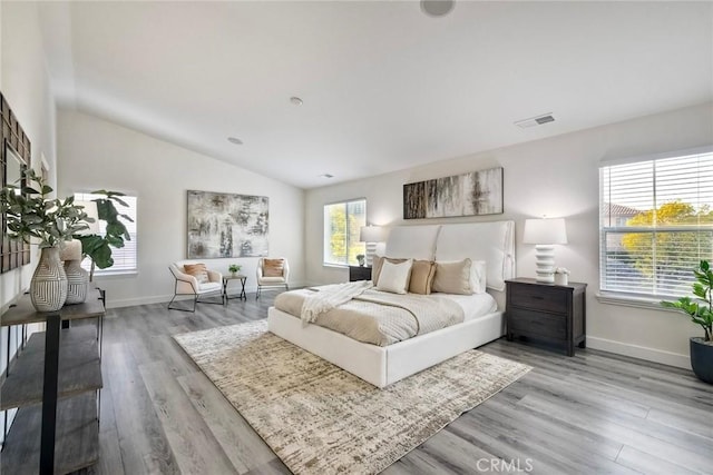 3184 Toopal Dr, Oceanside, CA 92058 - bedroom featuring vaulted ceiling and wood finished floors
