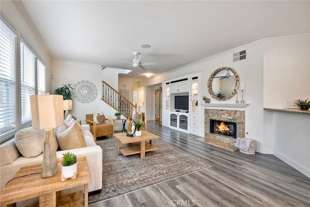 3184 Toopal Dr, Oceanside, CA 92058 - living area featuring stairs, wood finished floors, crown molding, a ceiling fan, and a high end fireplace