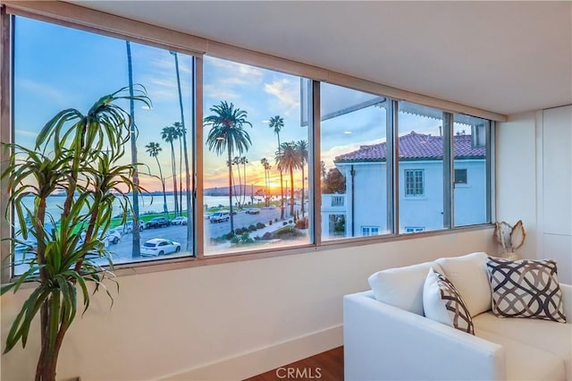2999 E Ocean Blvd Unit 210, Long Beach, CA 90803 - living area with baseboards and wood finished floors