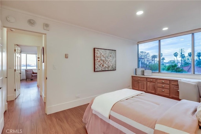 2999 E Ocean Blvd Unit 210, Long Beach, CA 90803 - bedroom featuring light wood finished floors, ornamental molding, baseboards, and recessed lighting