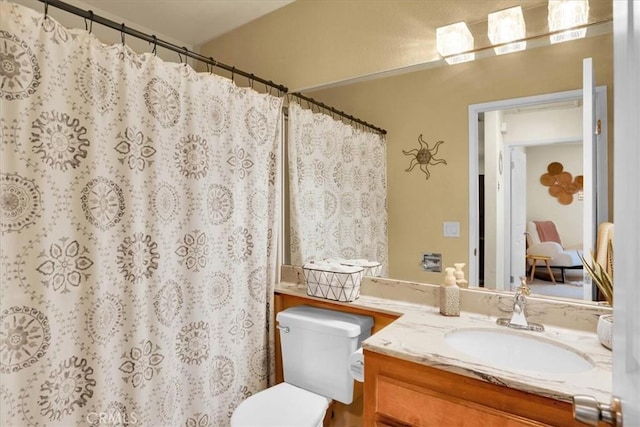 57716 Juarez Dr, Yucca Valley, CA 92284 - bathroom featuring vanity, toilet, and curtained shower