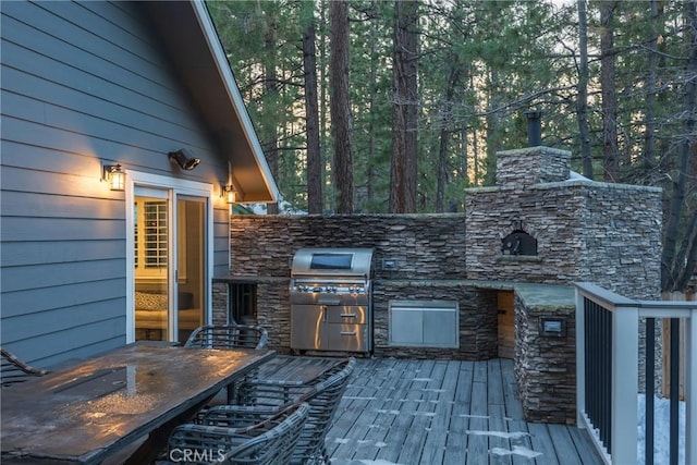 41496 Comstock Ln, Big Bear Lake, CA 92315 - wooden deck featuring outdoor dining space, exterior kitchen, and grilling area