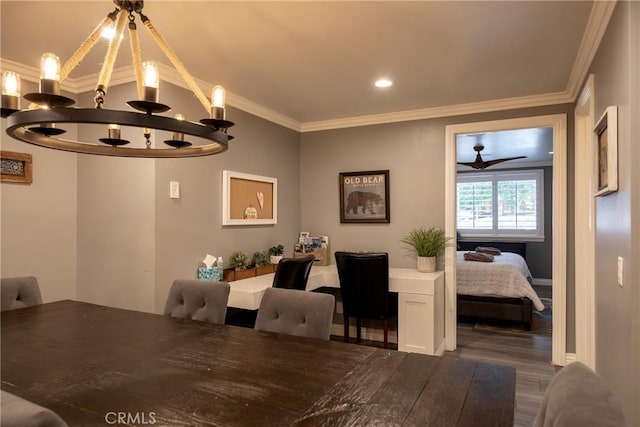 41496 Comstock Ln, Big Bear Lake, CA 92315 - dining space with a notable chandelier, wood finished floors, and ornamental molding