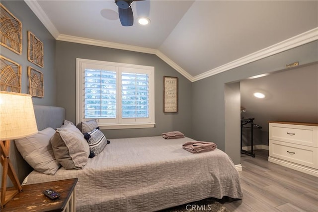 41496 Comstock Ln, Big Bear Lake, CA 92315 - bedroom with ceiling fan, baseboards, light wood-type flooring, vaulted ceiling, and ornamental molding