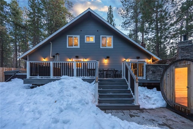 41496 Comstock Ln, Big Bear Lake, CA 92315 - snow covered rear of property with a wooden deck