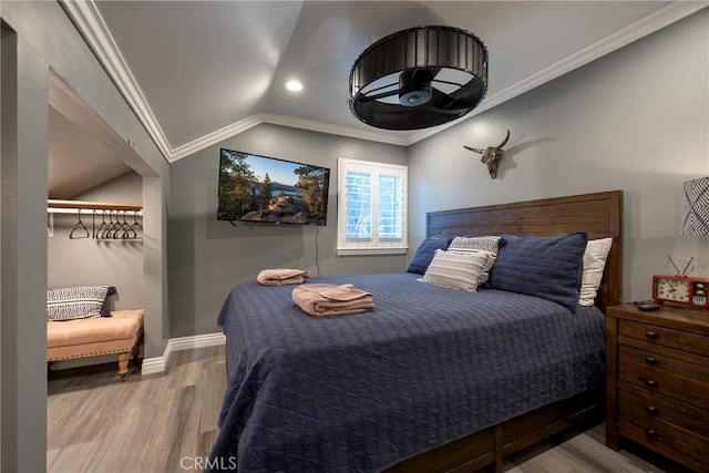 41496 Comstock Ln, Big Bear Lake, CA 92315 - bedroom with lofted ceiling, wood finished floors, recessed lighting, crown molding, and baseboards