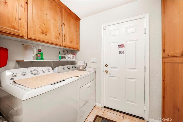 18051 Bold Venture Dr, Tehachapi, CA 93561 - clothes washing area featuring cabinet space, independent washer and dryer, and light tile patterned flooring