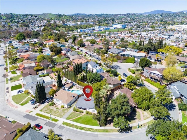 bird's eye view featuring a mountain view and a residential view