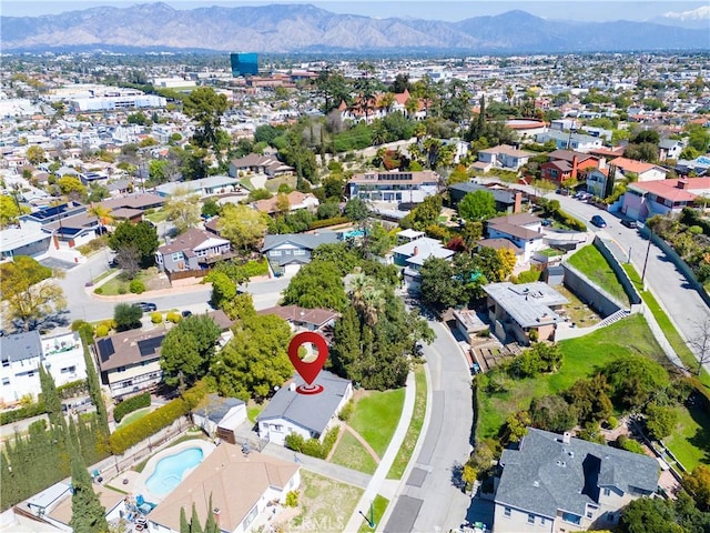 drone / aerial view featuring a mountain view and a residential view