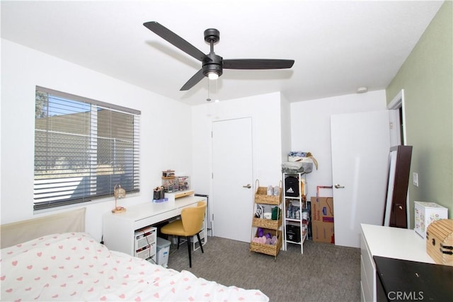 carpeted bedroom with ceiling fan