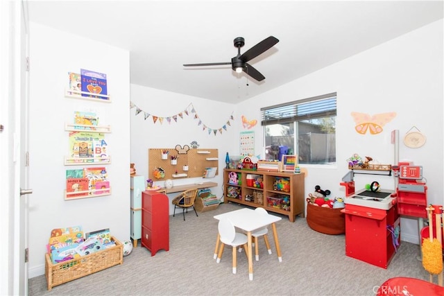 game room with carpet floors and ceiling fan