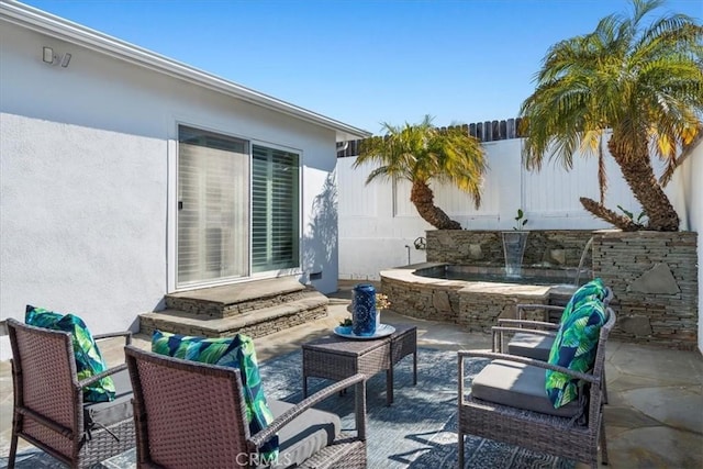 view of patio / terrace featuring a fenced backyard and an outdoor hangout area