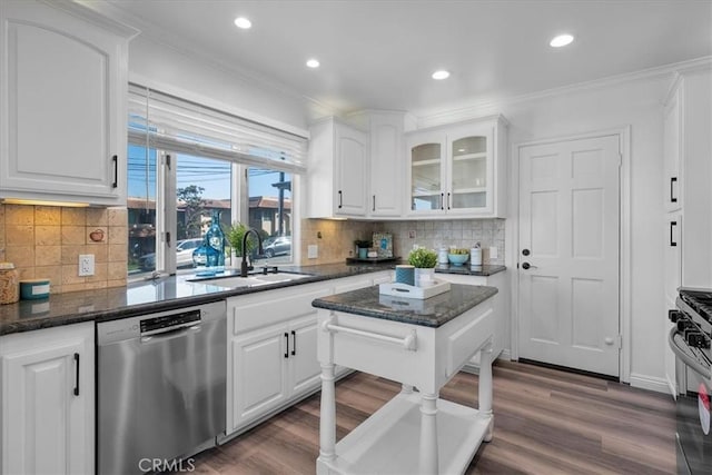 kitchen featuring range with gas cooktop, dishwasher, white cabinetry, a sink, and dark wood-style flooring