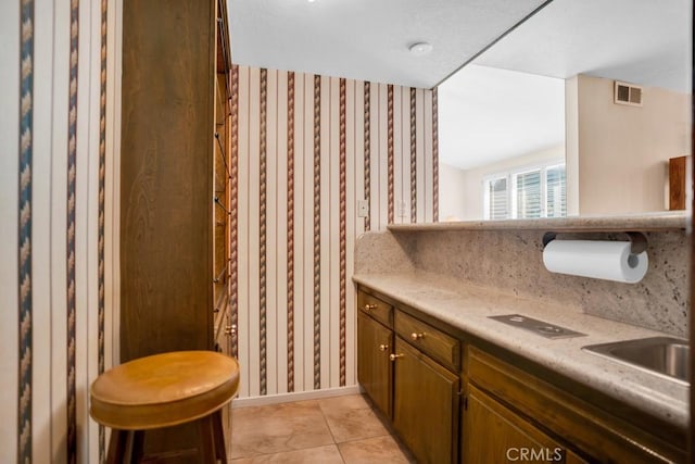 bathroom featuring vanity, tile patterned flooring, and visible vents