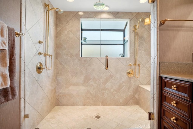 bathroom with a shower stall