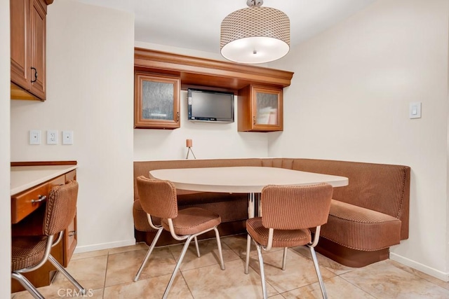 dining space with baseboards