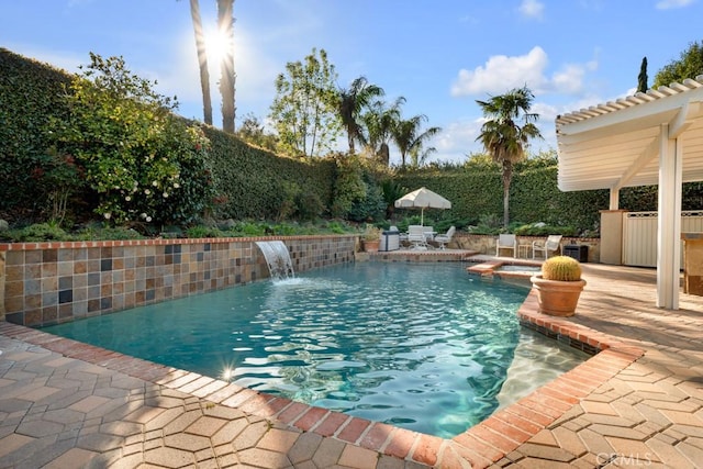view of pool with a fenced in pool and a patio