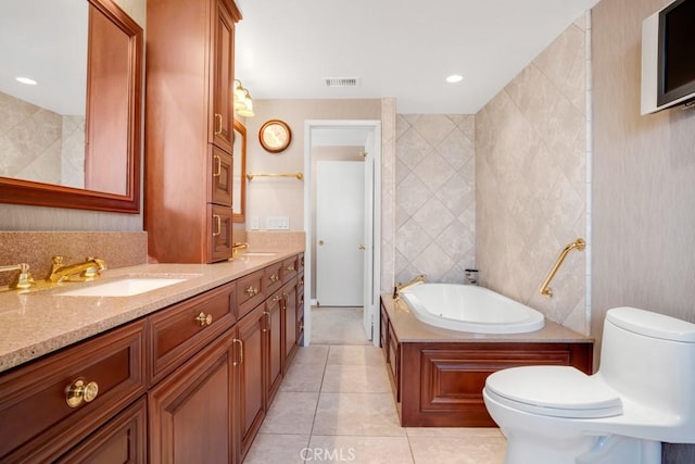 full bath with visible vents, a sink, toilet, tile patterned floors, and a garden tub