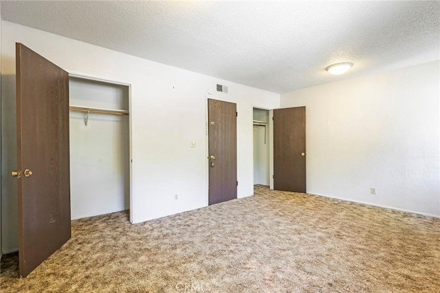 609 Rancheria Dr, Chico, CA 95926 - unfurnished bedroom featuring carpet flooring and a textured ceiling