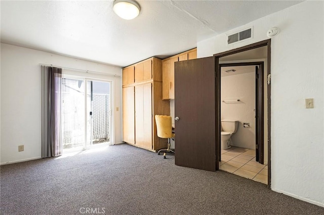 609 Rancheria Dr, Chico, CA 95926 - unfurnished bedroom with carpet flooring, access to outside, and ensuite bathroom