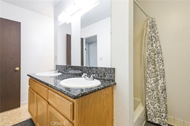 609 Rancheria Dr, Chico, CA 95926 - full bathroom featuring double vanity and shower / tub combo