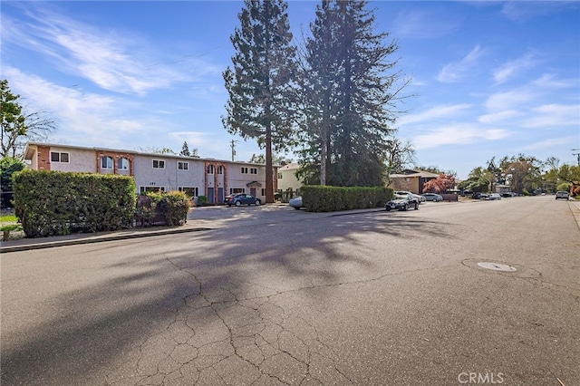 609 Rancheria Dr, Chico, CA 95926 - view of asphalt street with sidewalks, curbs, and a residential view