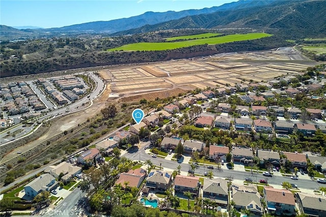 4224 Castlepeak Dr, Corona, CA 92883 - drone / aerial view featuring a mountain view and a residential view