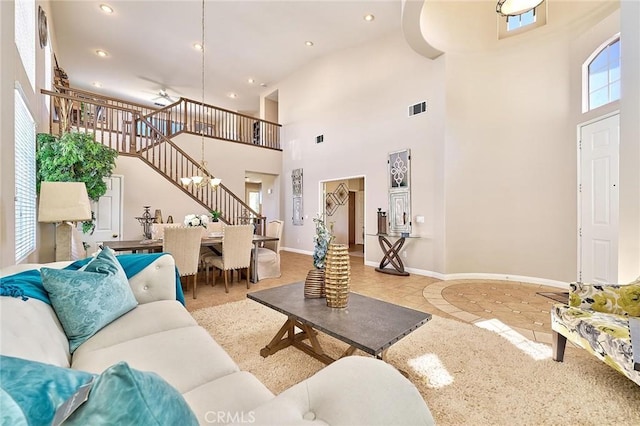 4224 Castlepeak Dr, Corona, CA 92883 - living area featuring ceiling fan, baseboards, stairs, and visible vents