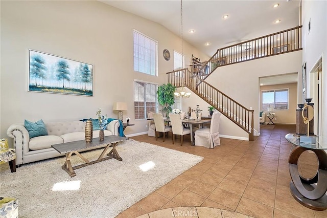 4224 Castlepeak Dr, Corona, CA 92883 - living room featuring stairway, recessed lighting, baseboards, a high ceiling, and light tile patterned flooring