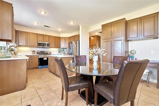 4224 Castlepeak Dr, Corona, CA 92883 - dining area featuring light tile patterned floors, recessed lighting, and visible vents