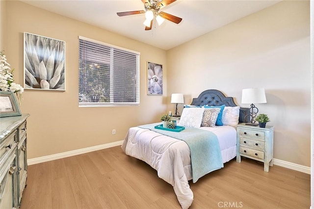 4224 Castlepeak Dr, Corona, CA 92883 - bedroom featuring baseboards, light wood finished floors, and ceiling fan